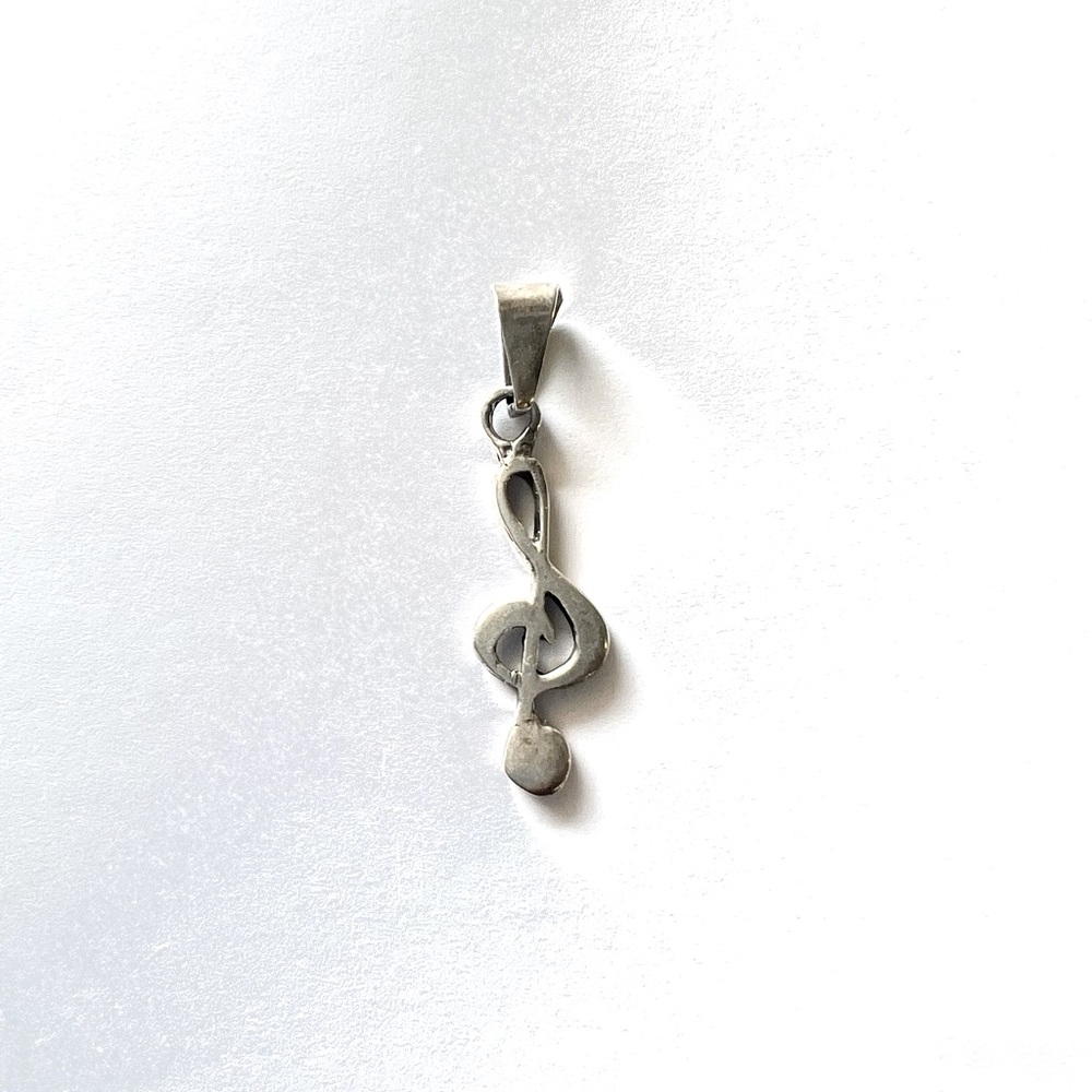 Silver musical note charm